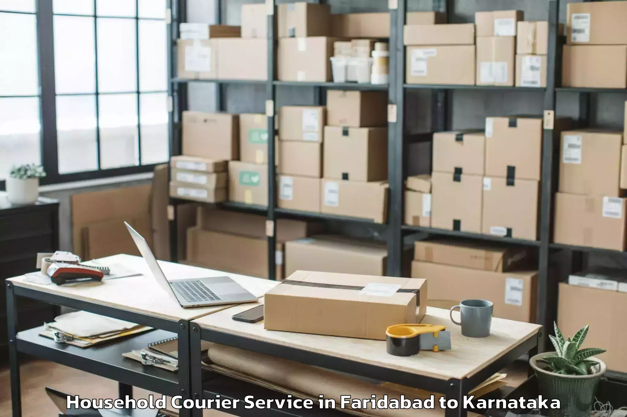 Trusted Faridabad to Maddur Household Courier